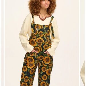 Brand new, still in package Lucy and Yak sunflower overalls, size 12